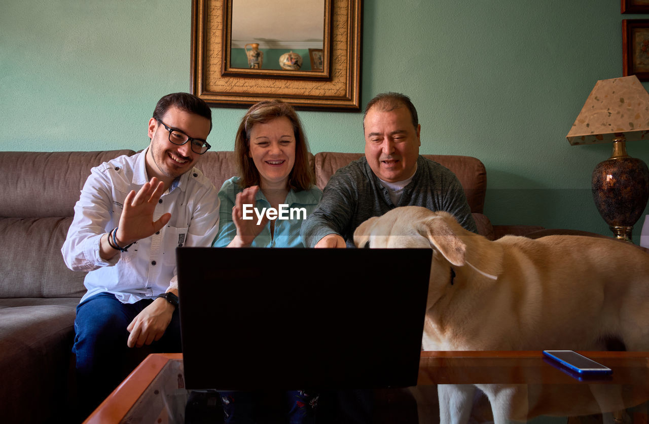 Family talks online in their living room