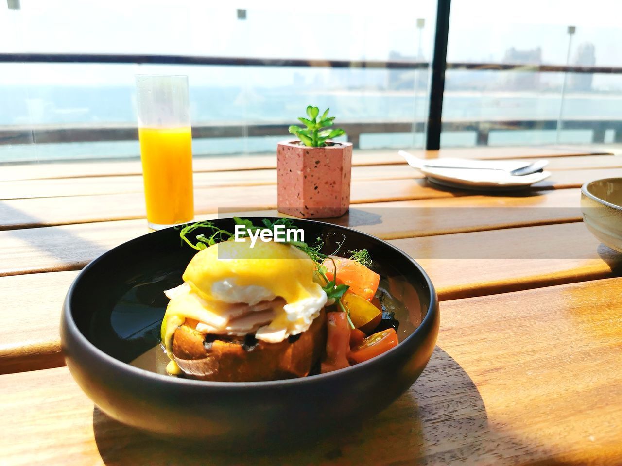 CLOSE-UP OF FOOD SERVED WITH DRINK ON TABLE