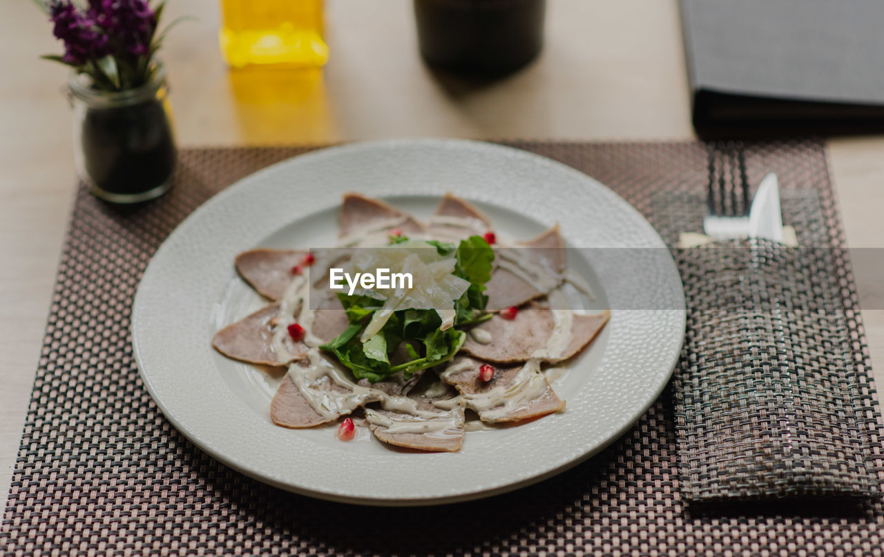 high angle view of food served on table