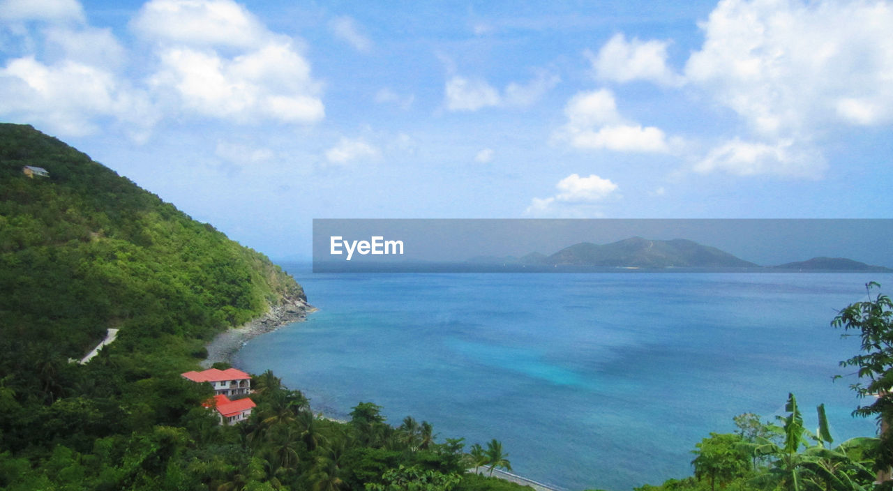 SCENIC VIEW OF SEA AND MOUNTAIN AGAINST SKY