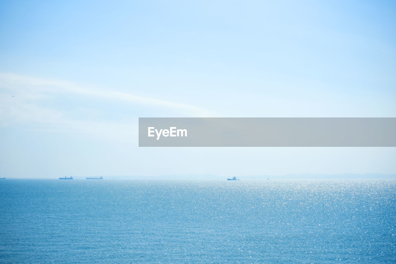 SCENIC VIEW OF SEA AGAINST BLUE SKY