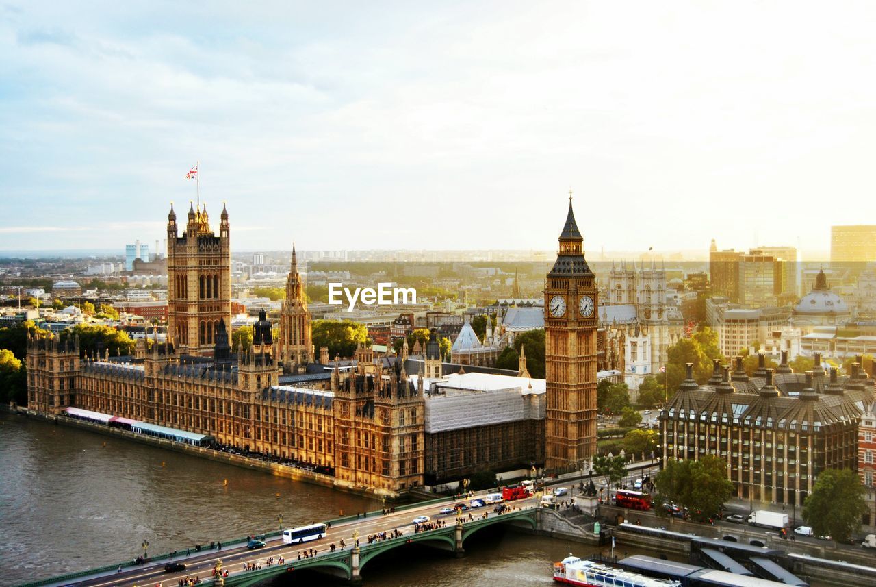 High angle view of westminster bridge by big ben against sky