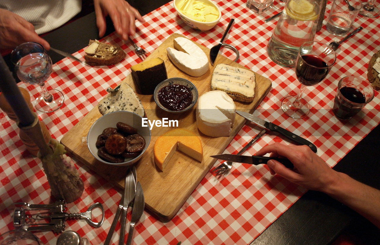 High angle view of people eating food at table