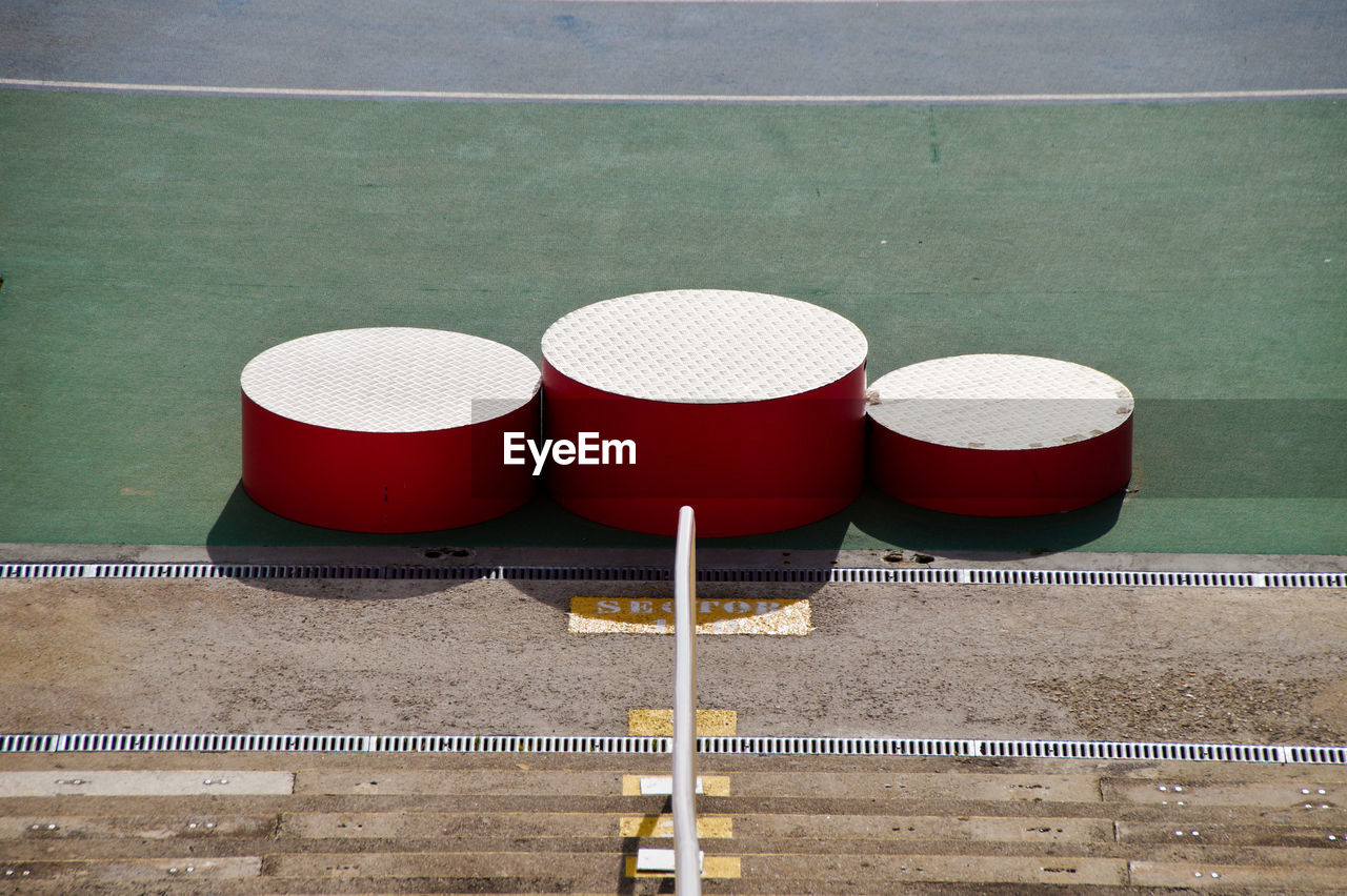 High angle view of empty deck chairs