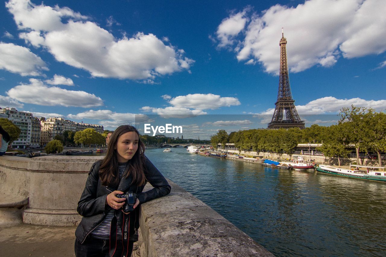 YOUNG WOMAN LOOKING AT VIEW