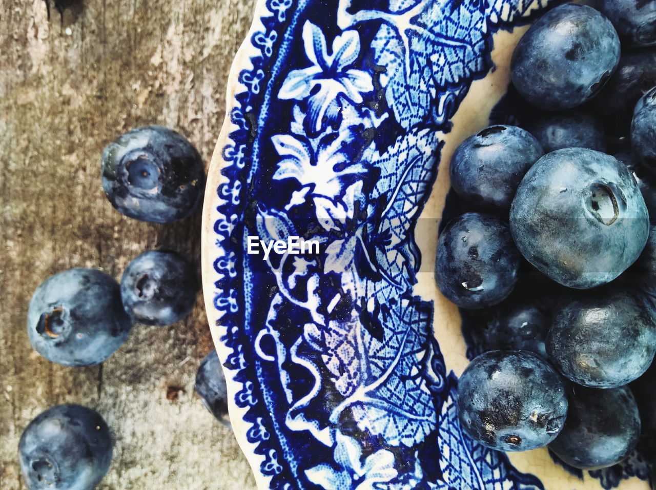 High angle view of blueberries in container on table