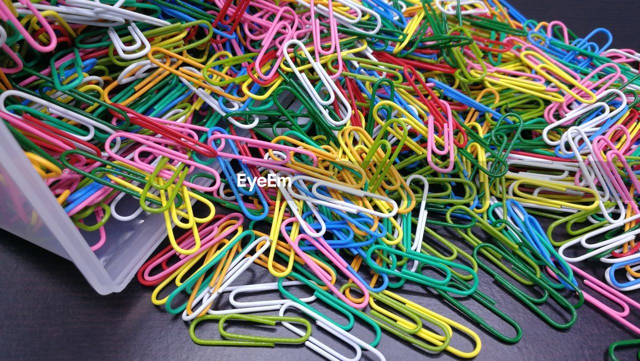 Close-up of colorful paper clips on table in store