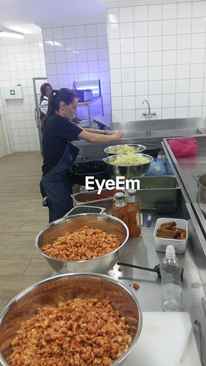 PERSON PREPARING FOOD