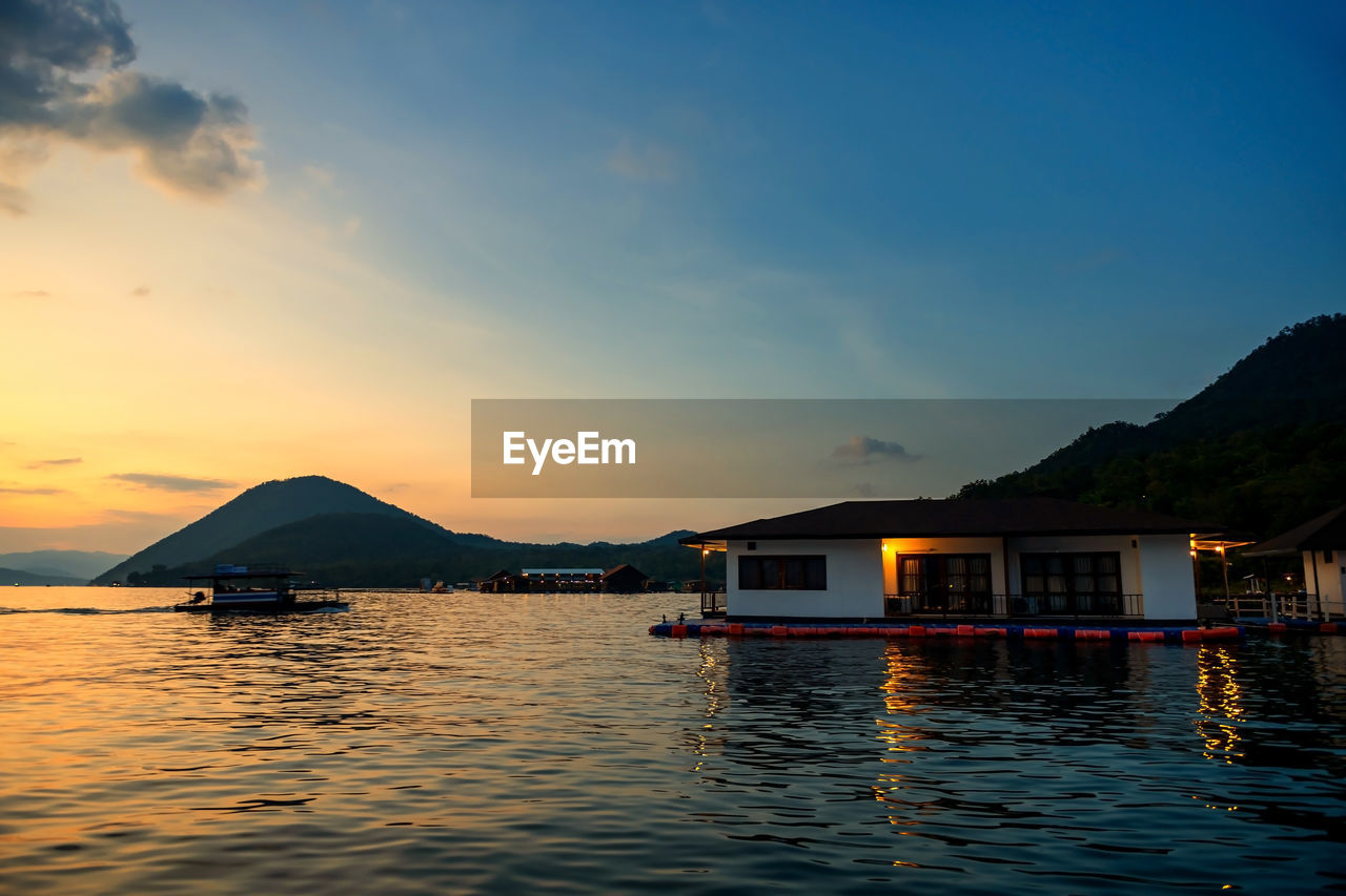 scenic view of sea against clear sky during sunset