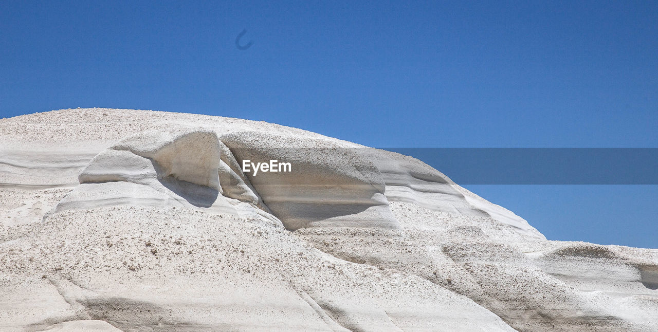 LOW ANGLE VIEW OF A ROCK FORMATION