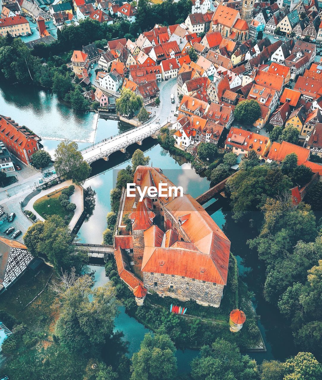 High angle view of buildings and bridge in city