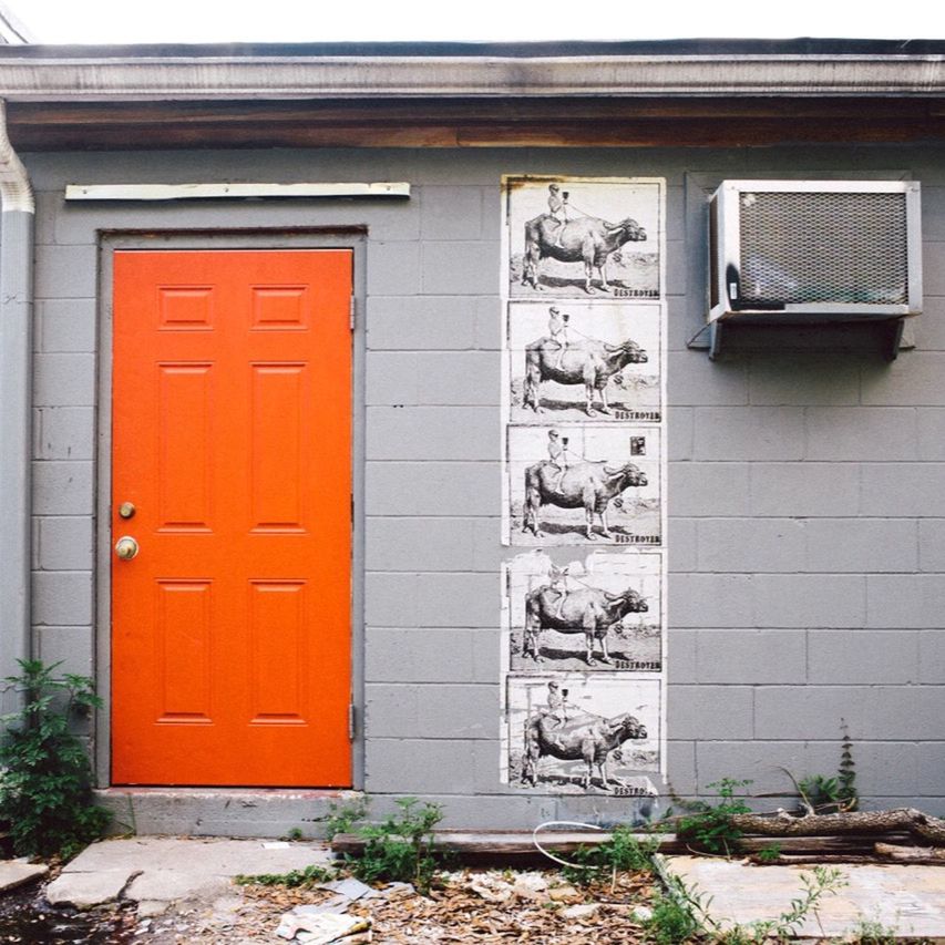 EXTERIOR OF HOUSE WITH RED DOOR