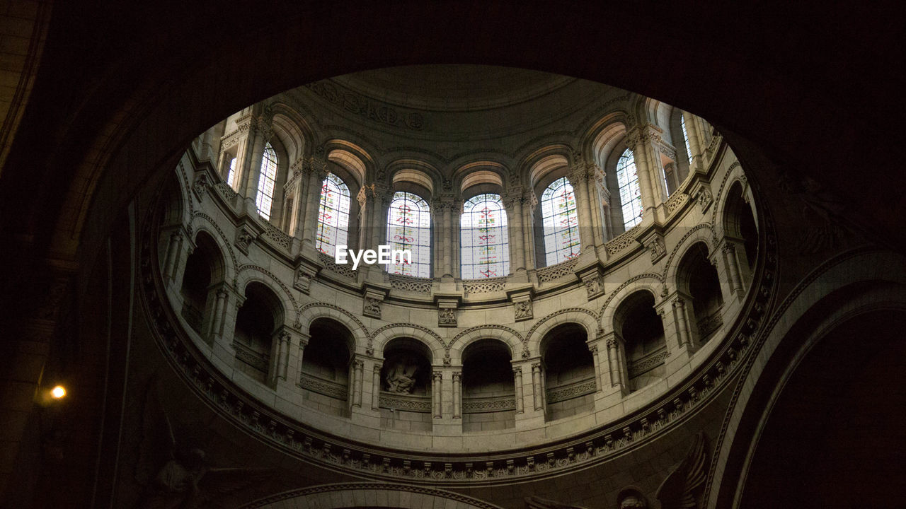 LOW ANGLE VIEW OF A WINDOW OF A CHURCH