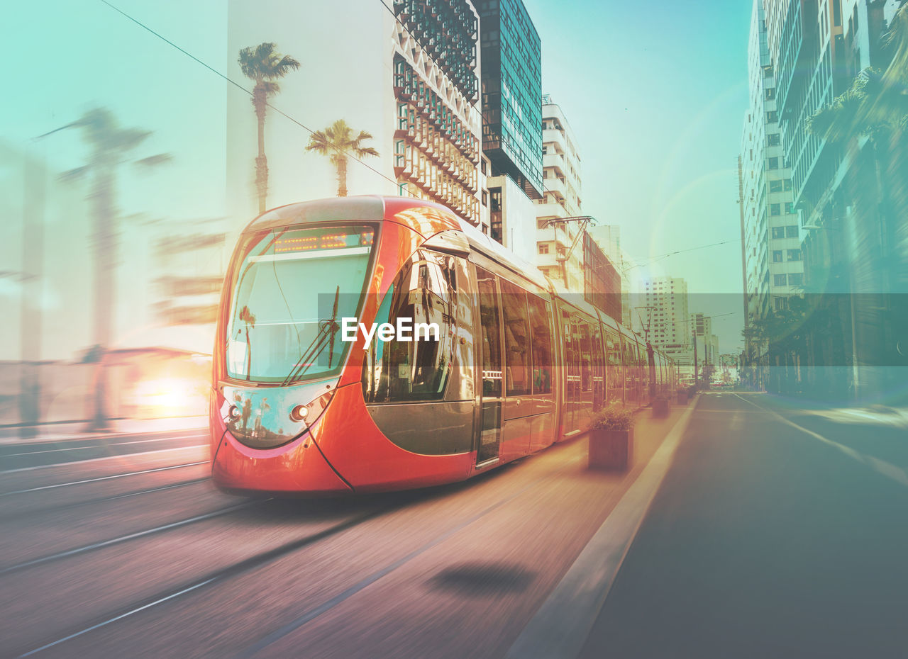 Cable car on road in city