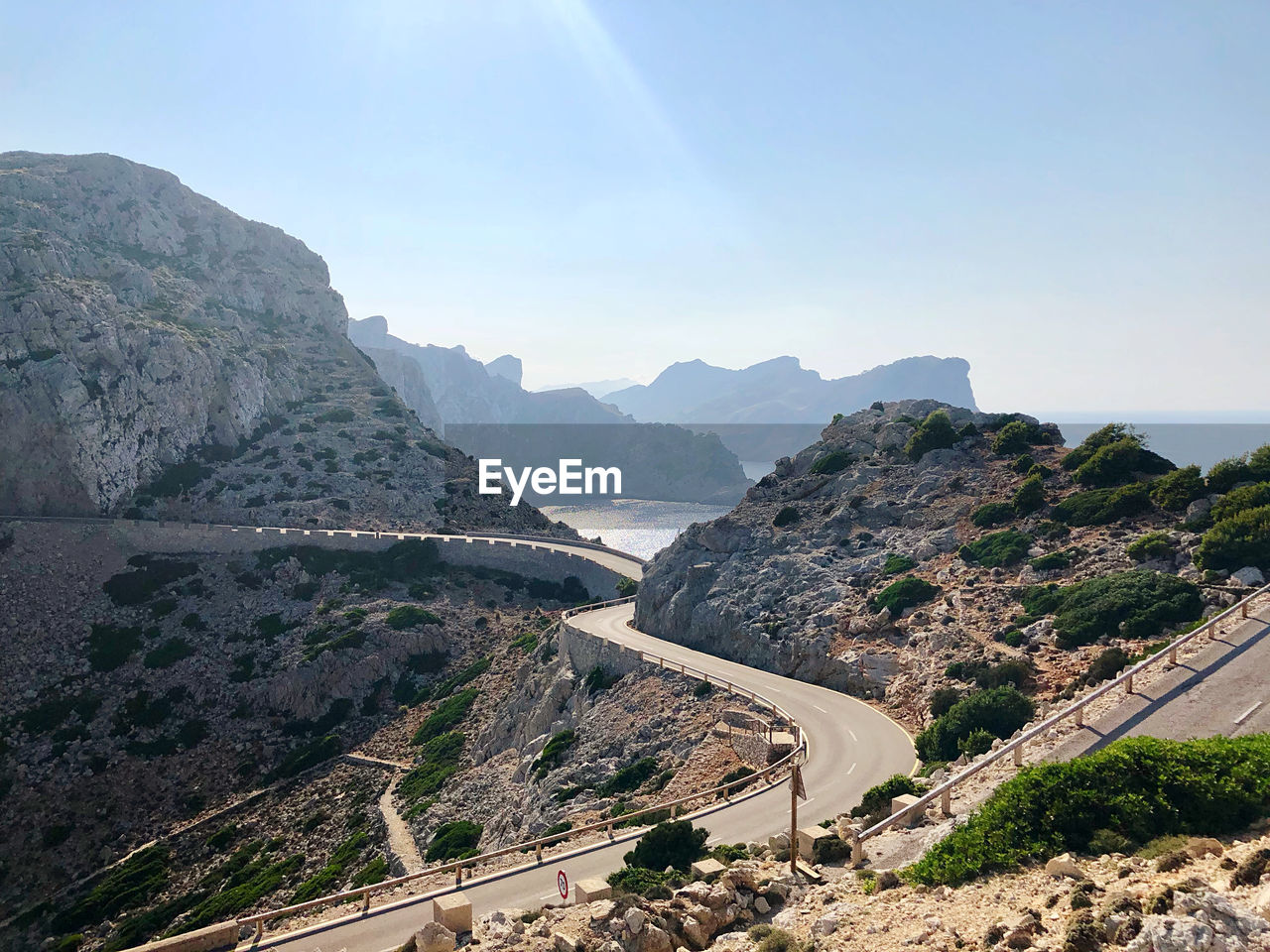 High angle view of road amidst mountains against sky