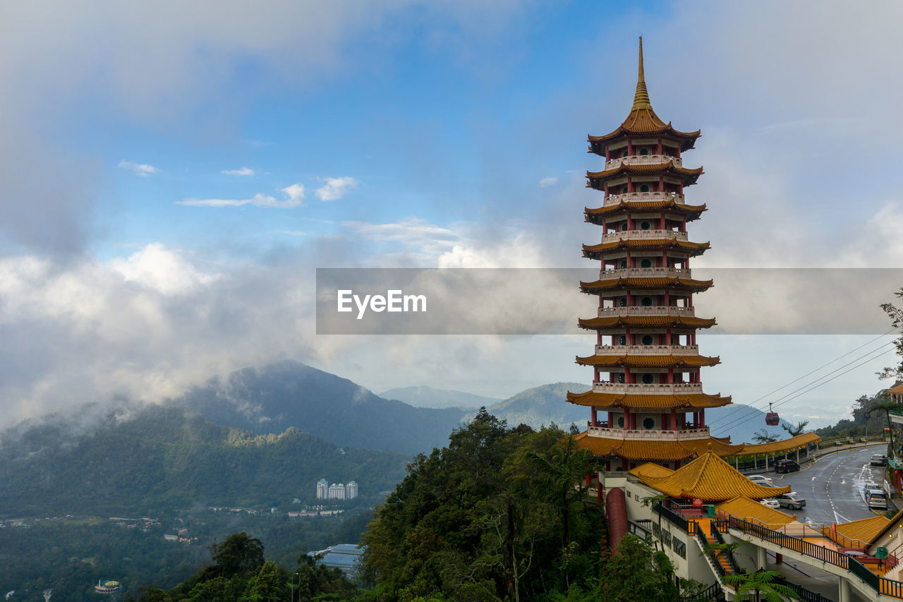 View of temple against cloudy sky