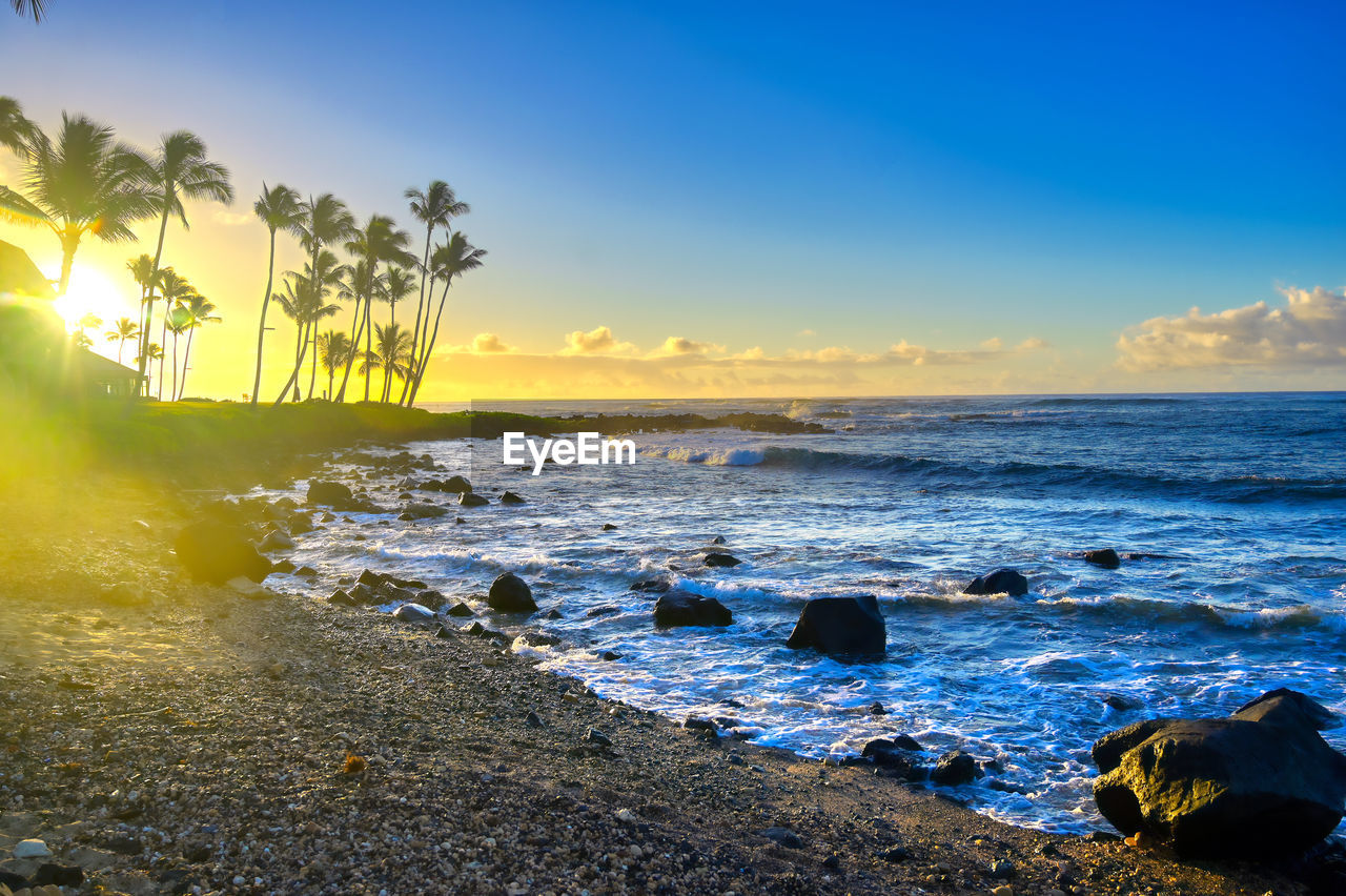 Scenic view of sea against sky during sunset