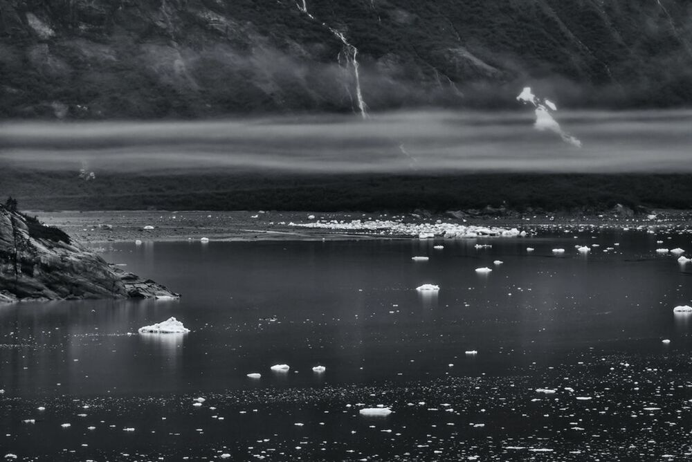 Ice floating on water at seaside