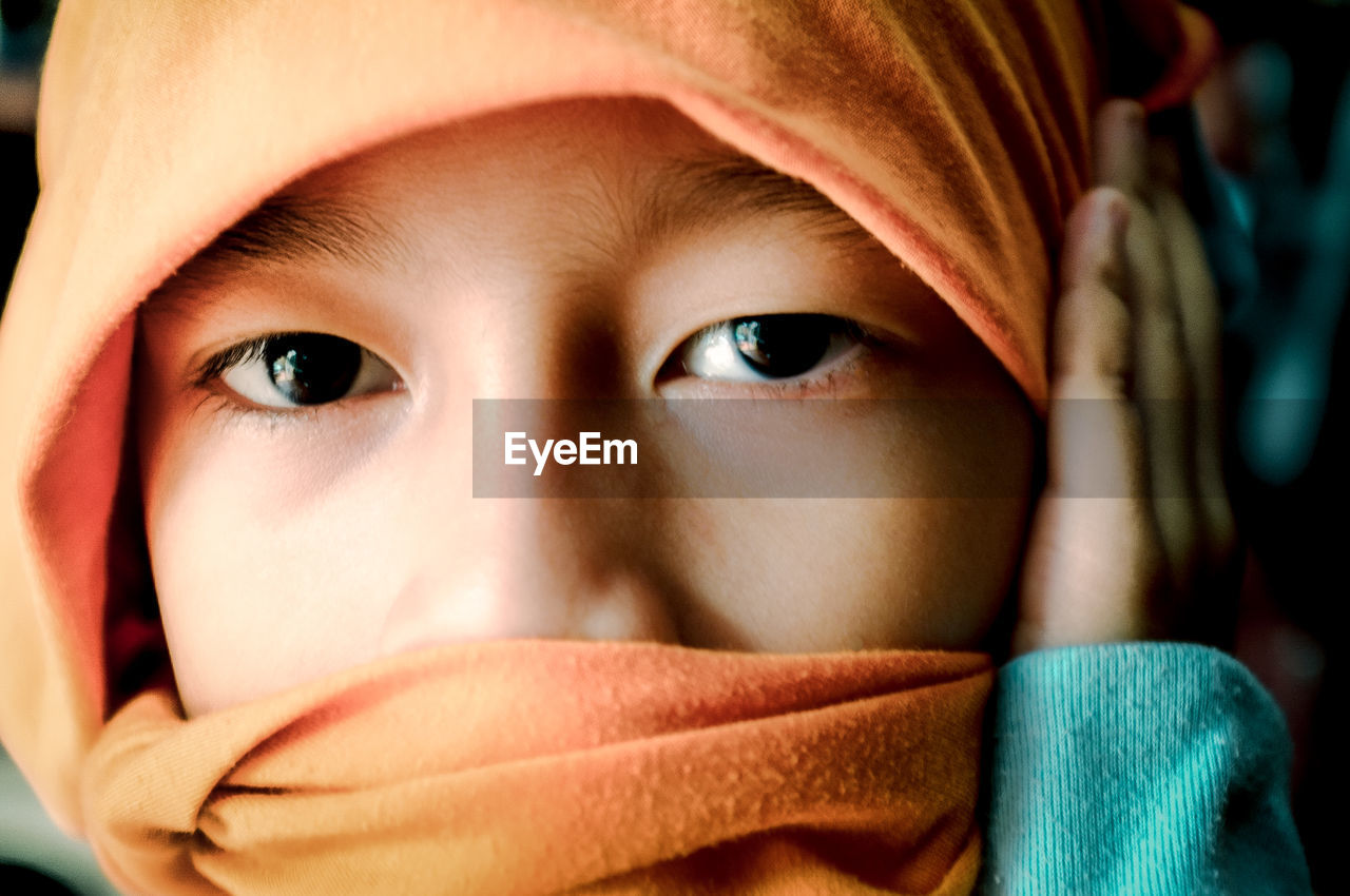 Close-up portrait of woman wearing hijab