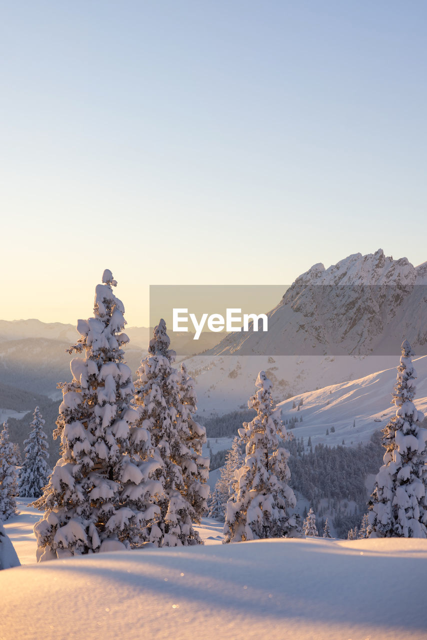 Sunset in the snowy alps after a snowfall