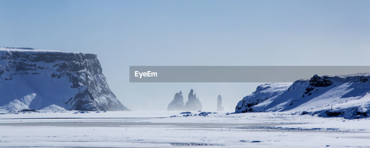 Panorama shot of three pinnacles of vik, south iceland in wintertime