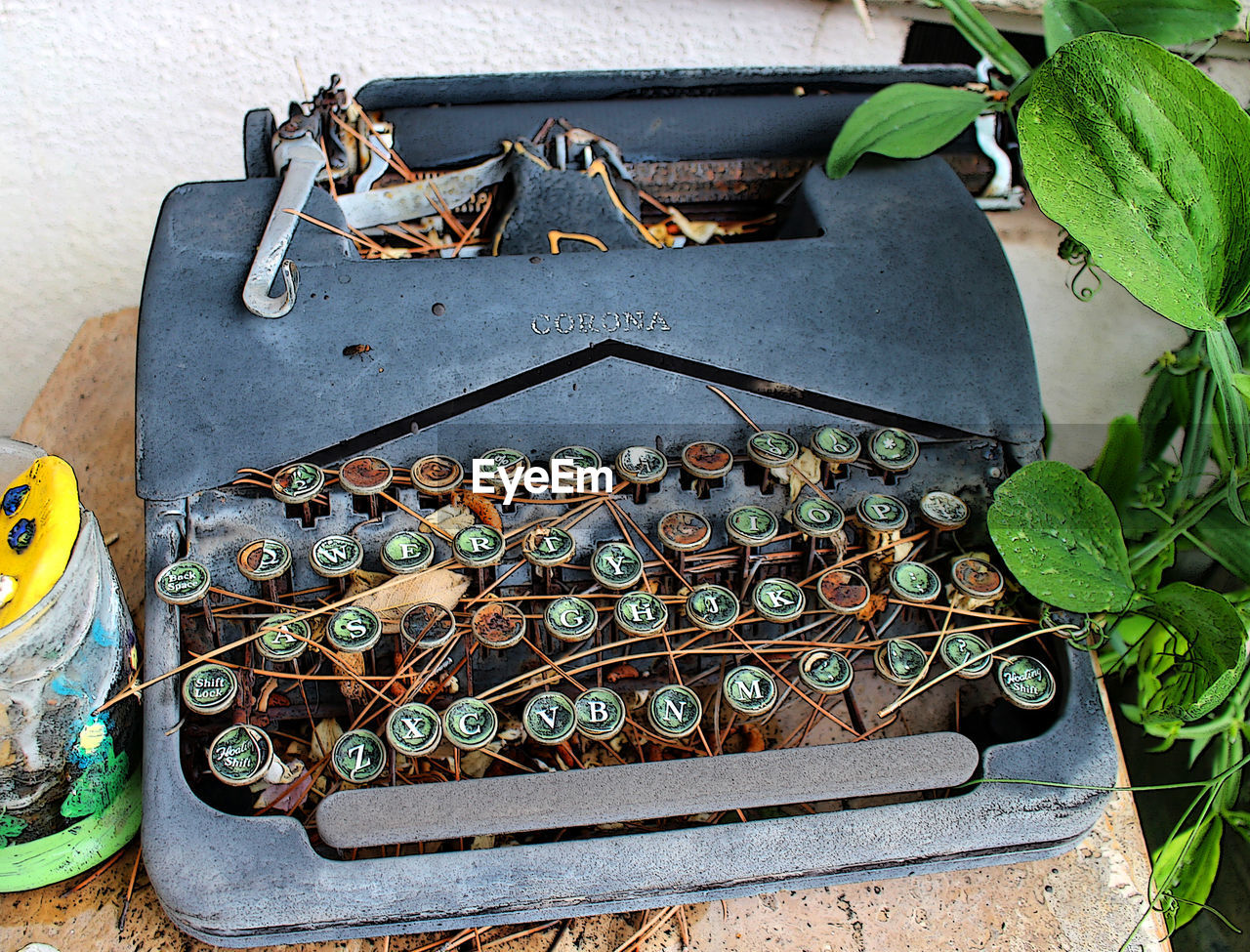 High angle view of abandoned typewriter on table