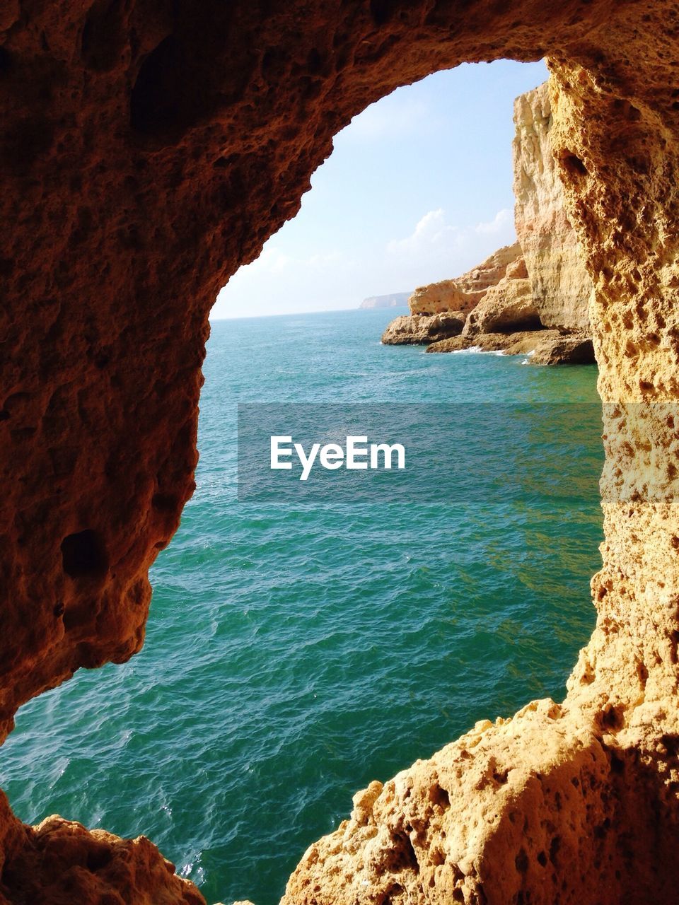 High angle view of sea seen from rocky cliff