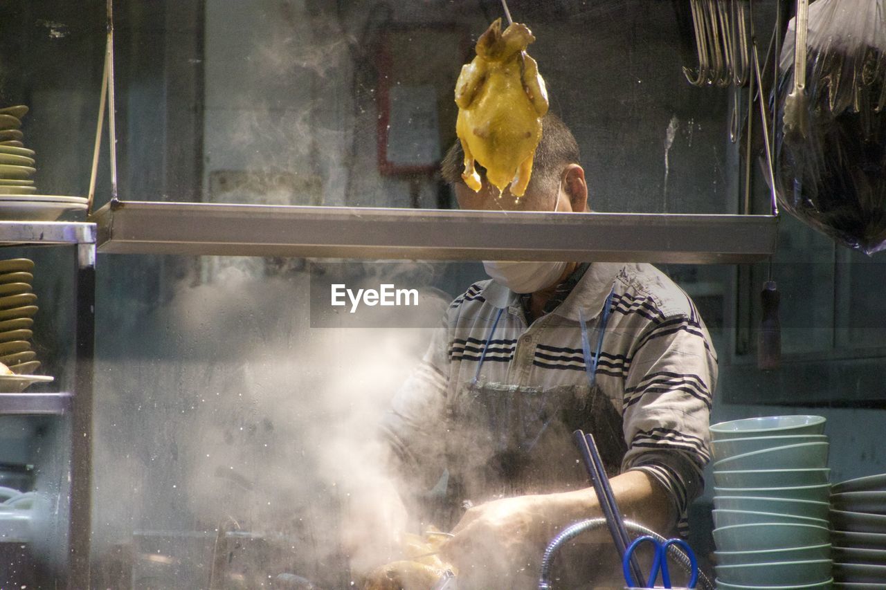 Man cooking street food