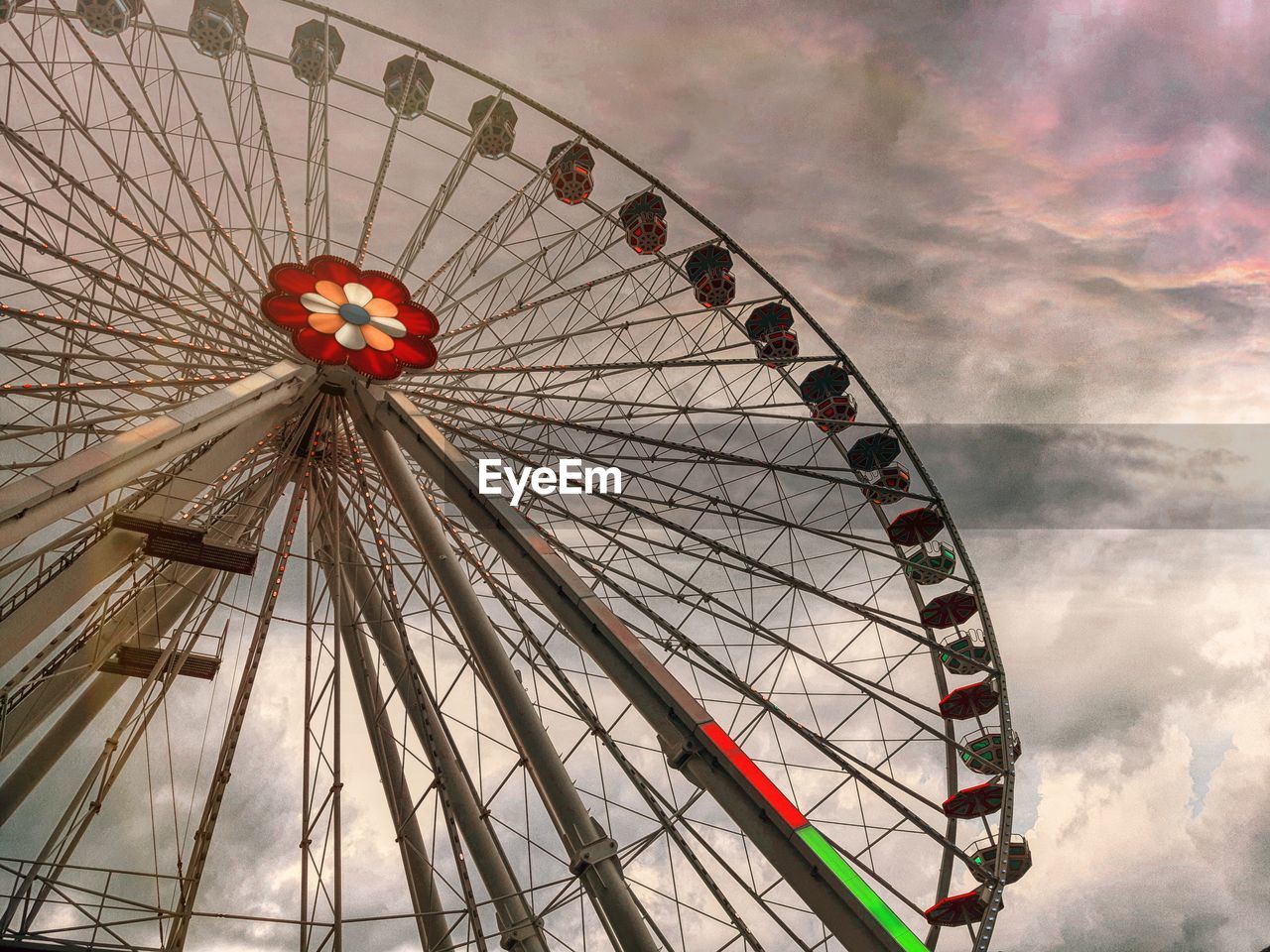 LOW ANGLE VIEW OF FERRIS WHEEL AGAINST SKY