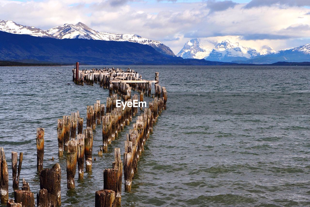 Groyne in sea during winter