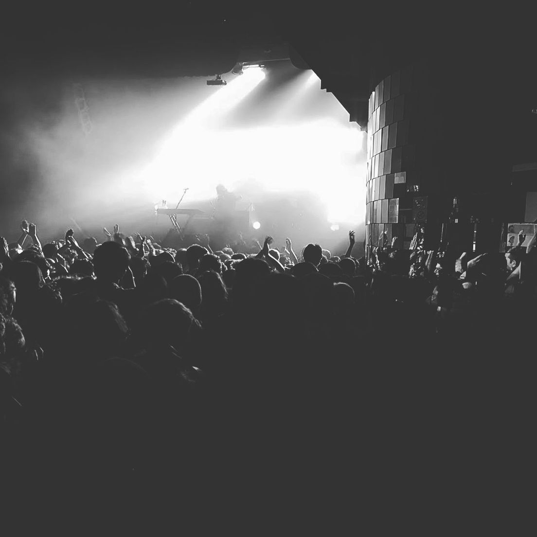 CROWD ENJOYING MUSIC CONCERT AT NIGHT