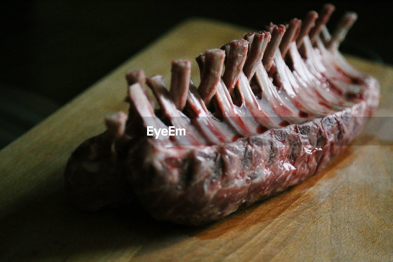 Close-up of meat on cutting board