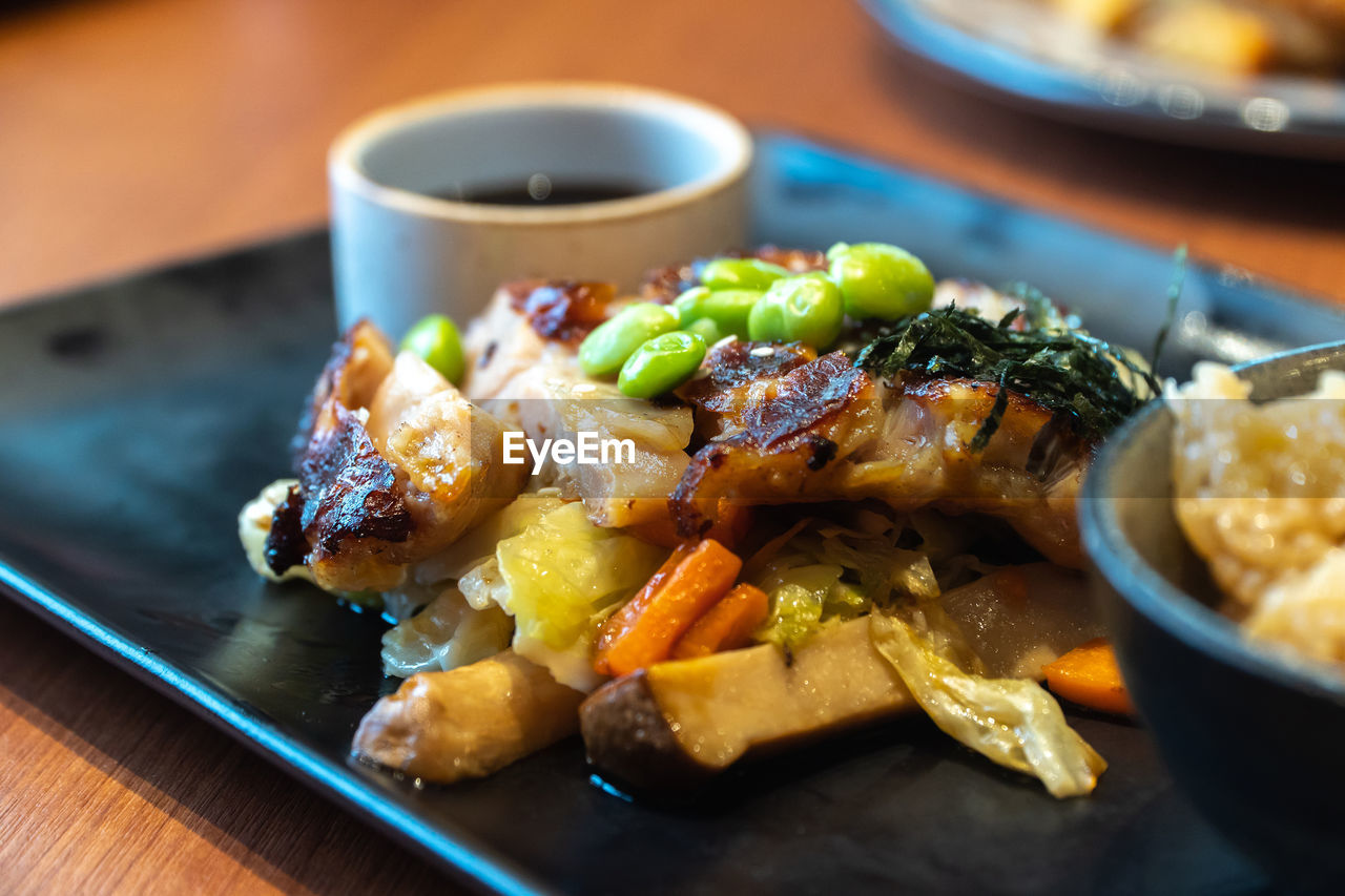 CLOSE-UP OF SERVED FOOD IN TRAY