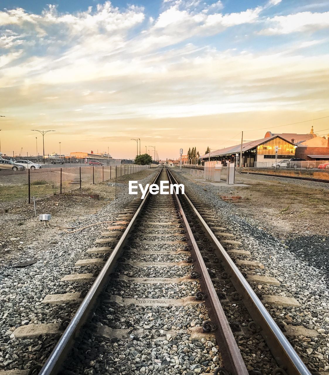 RAILROAD TRACKS AGAINST SKY