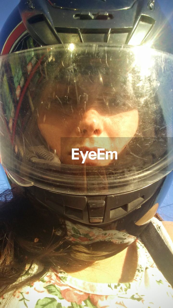 CLOSE-UP PORTRAIT OF WOMAN WITH REFLECTION IN MIRROR