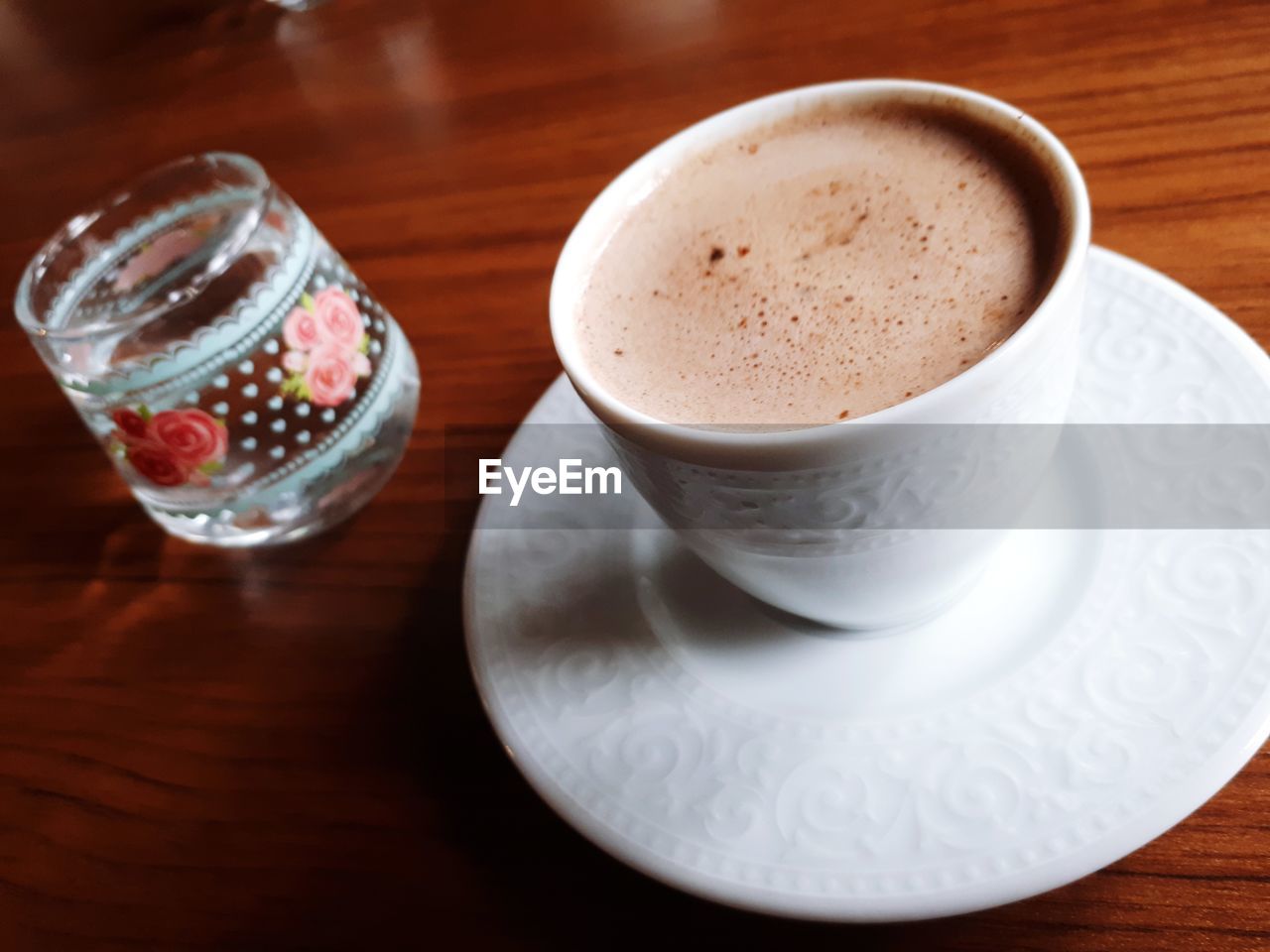 CLOSE-UP OF COFFEE ON TABLE