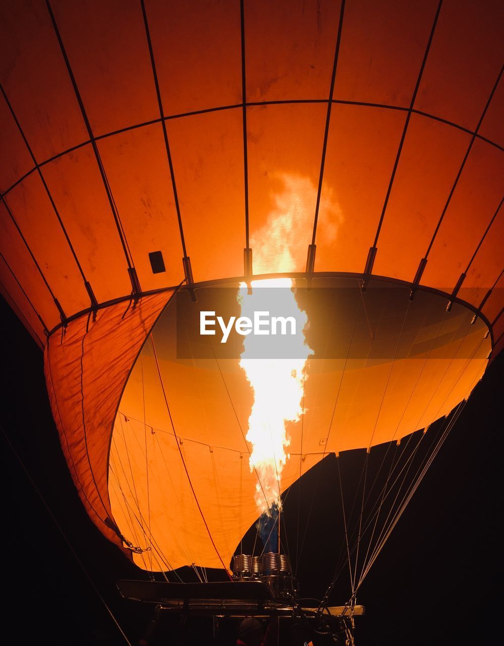 low angle view of silhouette hot air balloons