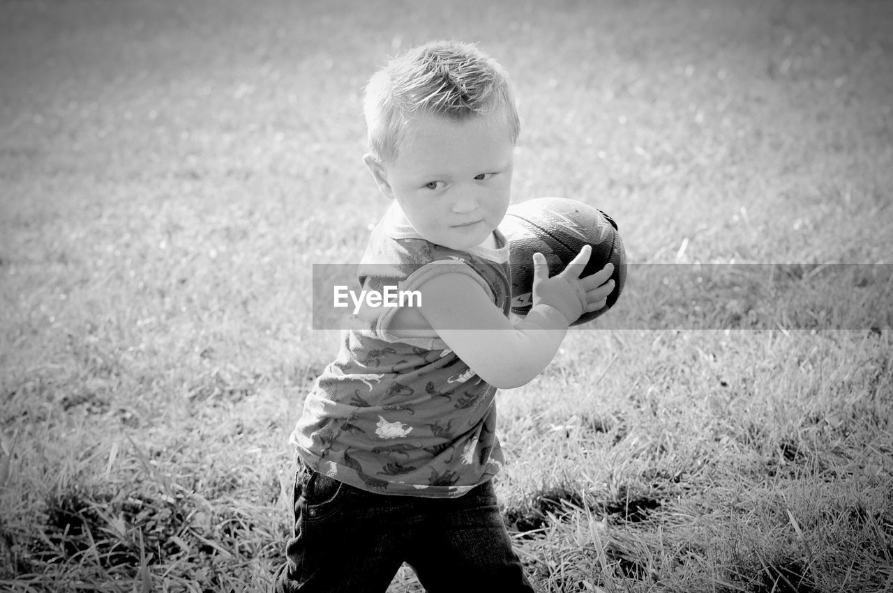 Boy playing football