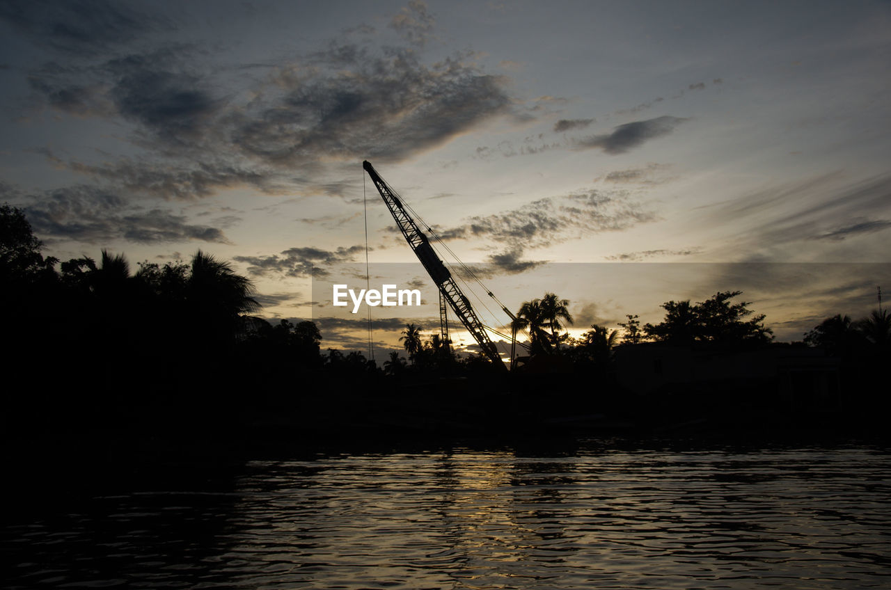 REFLECTION OF WINDMILL ON WATER