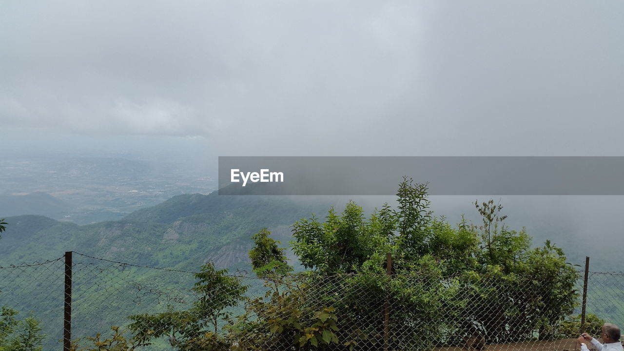 High angle view of mountains in foggy weather