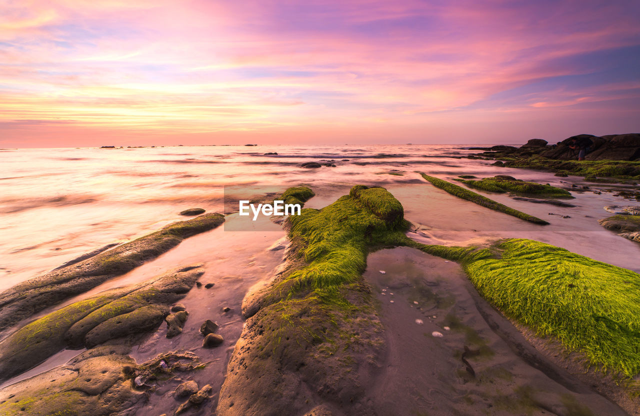 SCENIC VIEW OF SEA DURING SUNSET