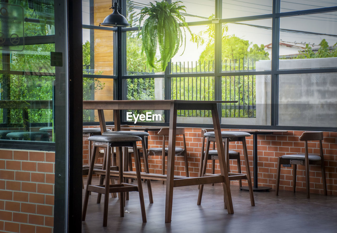 A corner of a coffee shop is used as a background for the coffee shop scene.