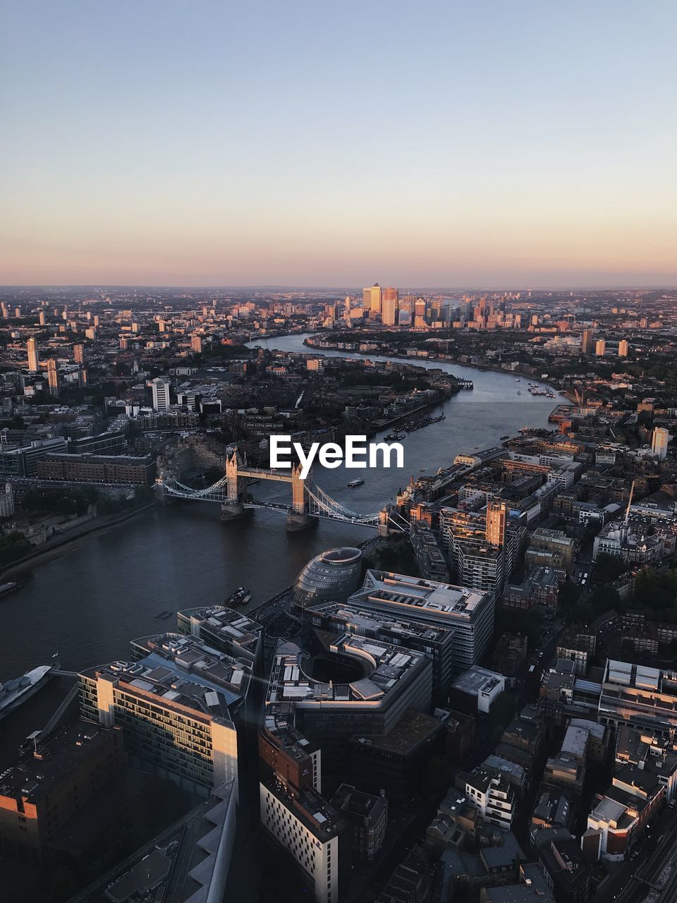 High angle view of river amidst buildings in city