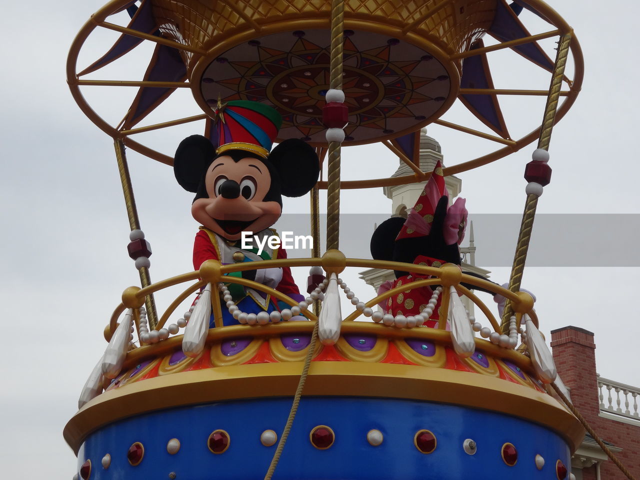 LOW ANGLE VIEW OF FERRIS WHEEL AGAINST SKY