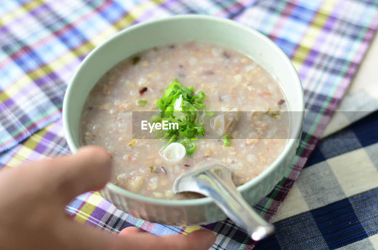 HIGH ANGLE VIEW OF SOUP ON TABLE