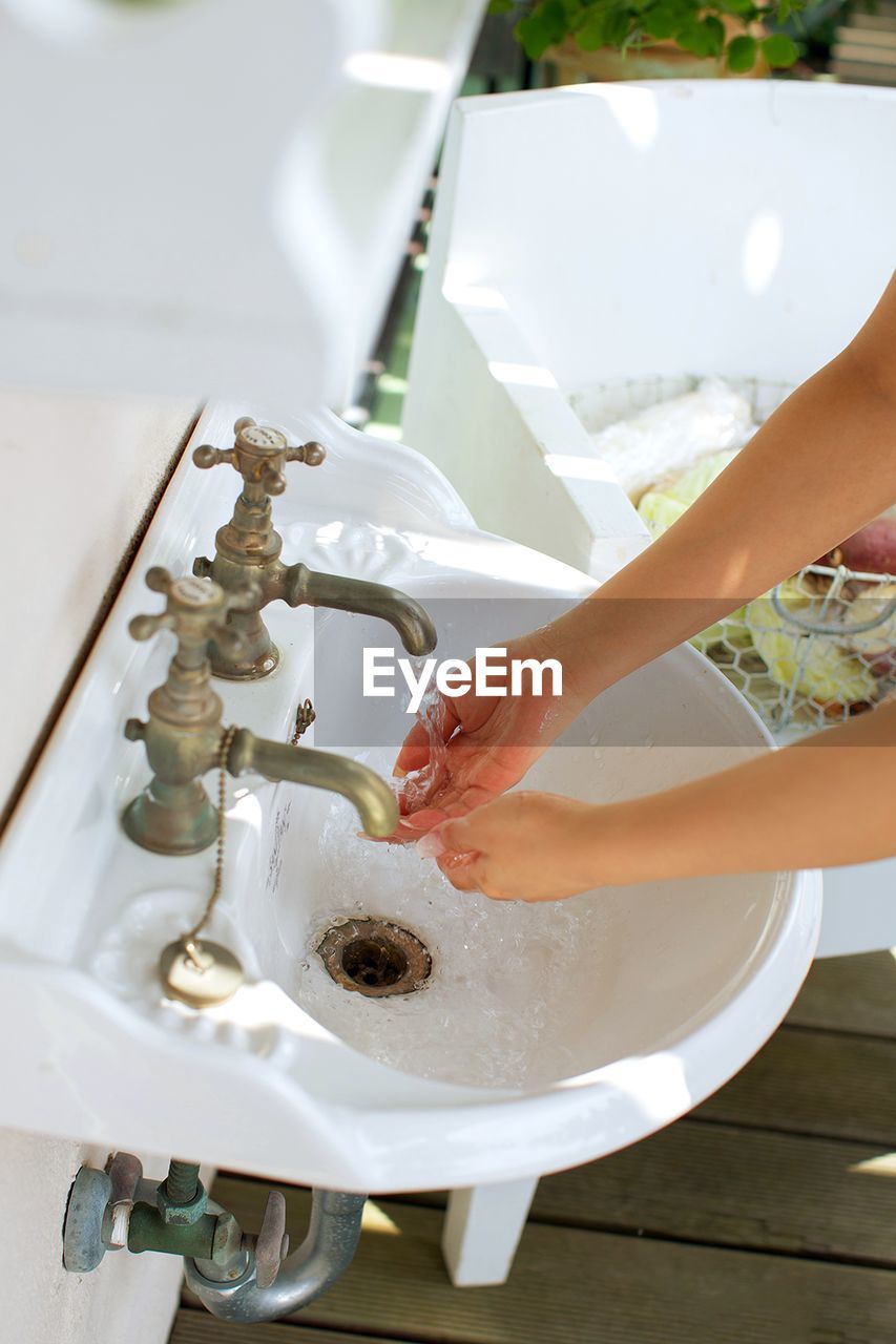 High angle view of woman in bathtub