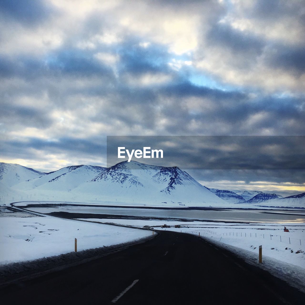 Scenic view of snow covered landscape against sky