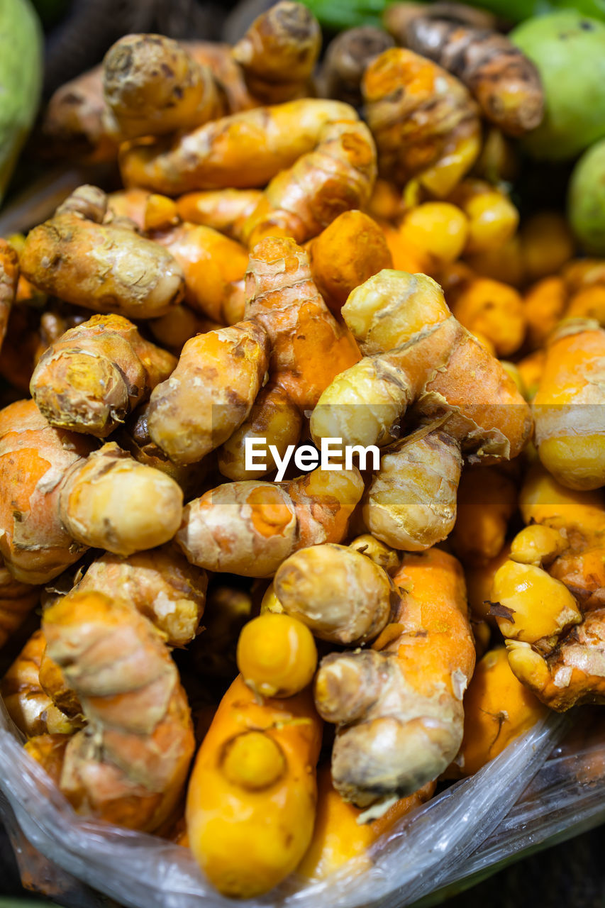 Raw turmeric vegetables at vegetable store for sale at evening