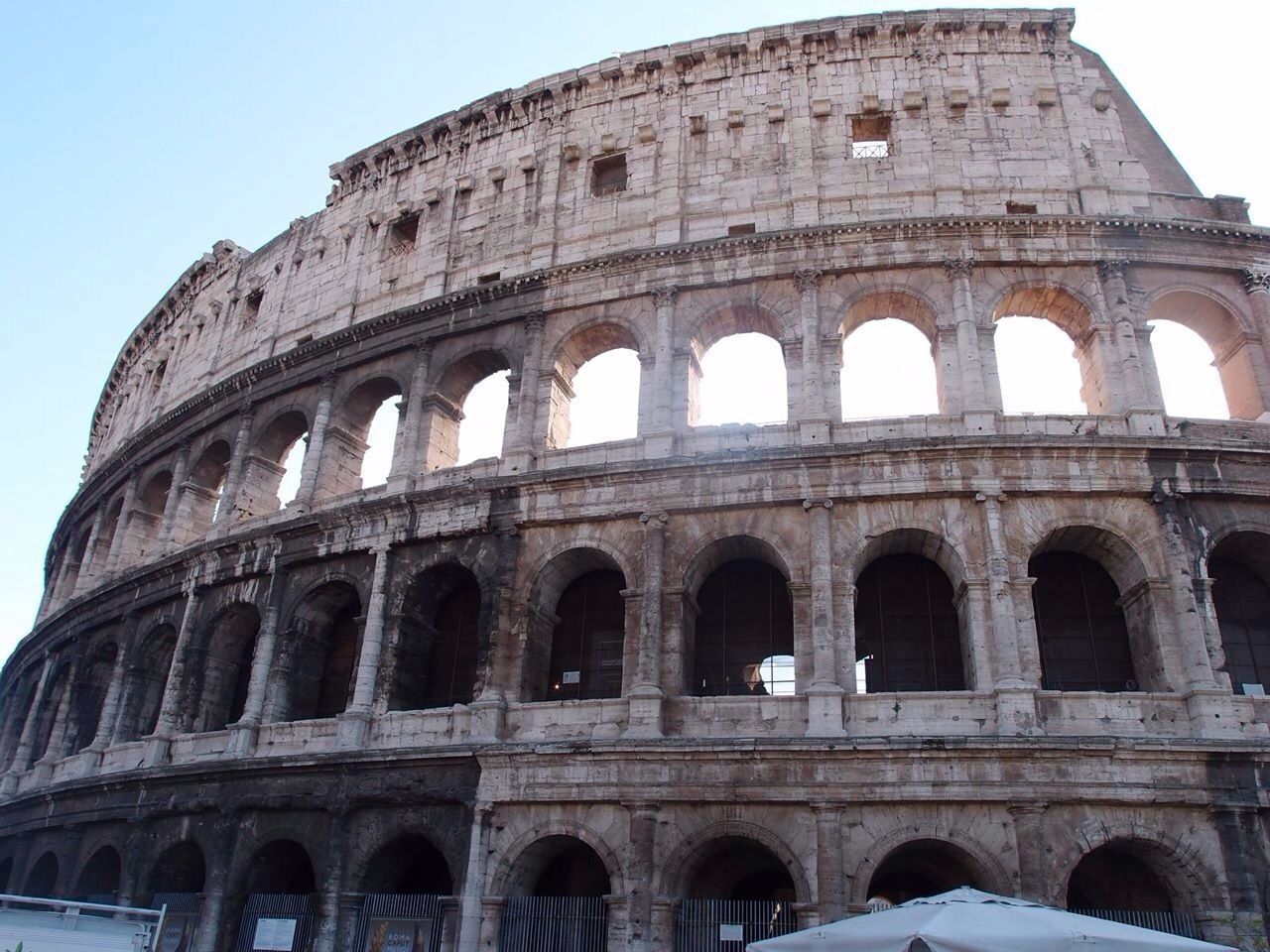 Low angle view of colosseum against clear sky