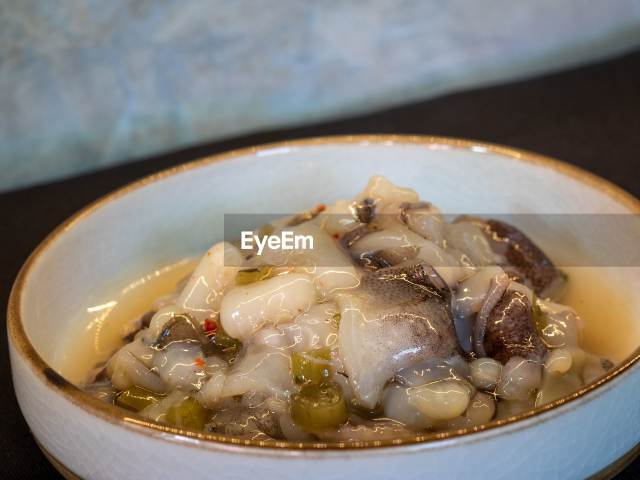 HIGH ANGLE VIEW OF FRESH SOUP IN BOWL